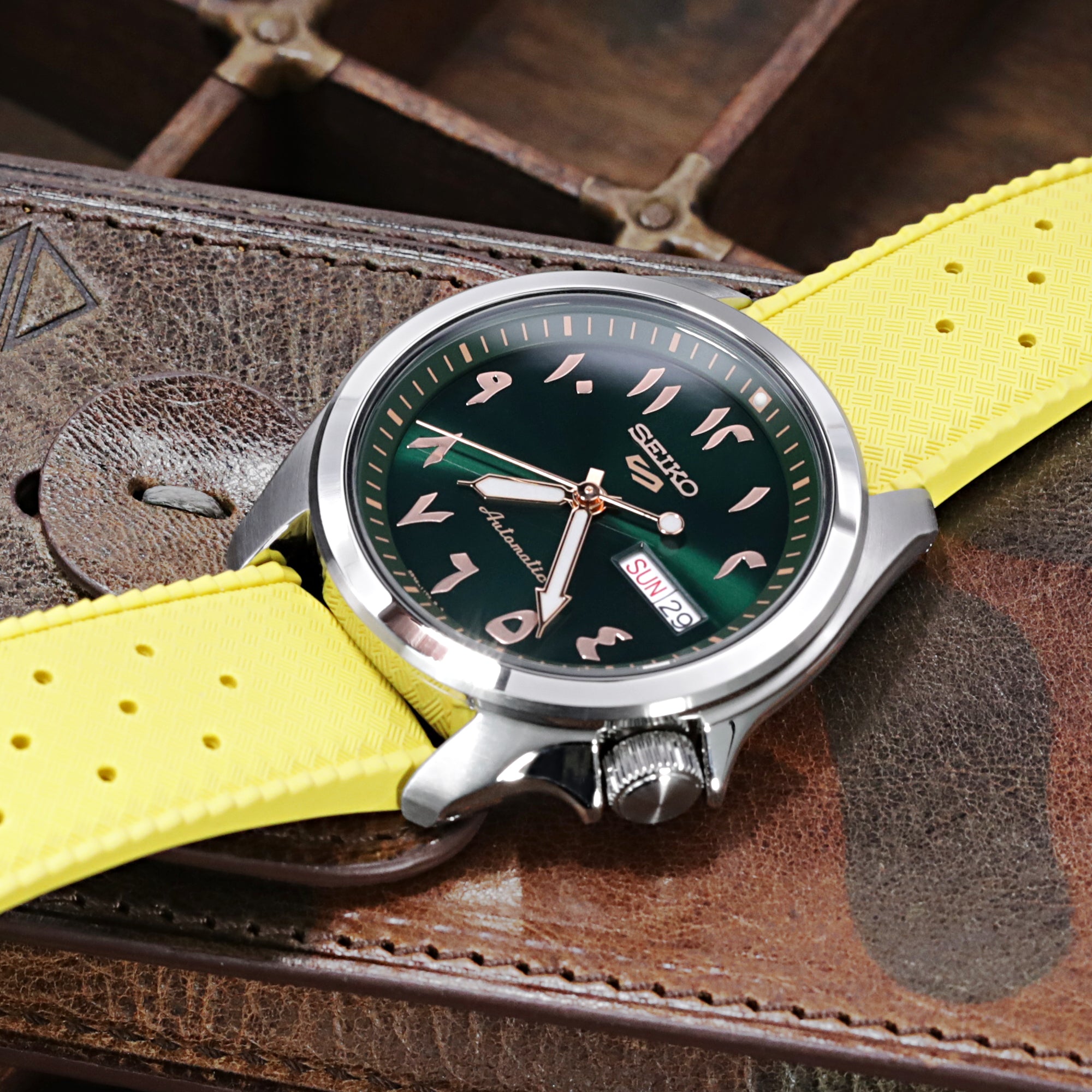 Seiko 5 Sports SRPH49K1 with all hours marks numbered and a vivid yellow rubber watch strap