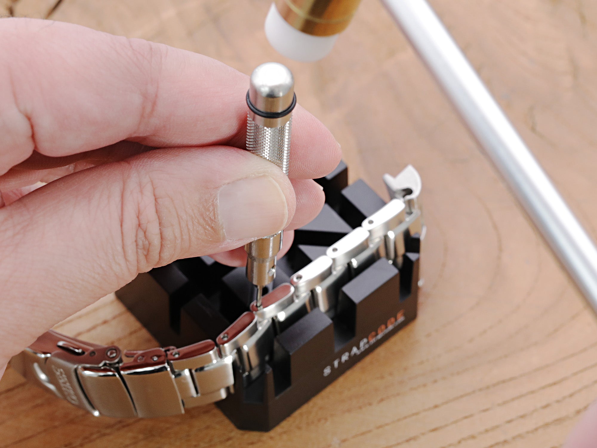 Demo of how to remove watch band pins by using proper watch band tools