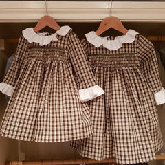 Sue Hill bespoke hand smocked tartan dresses