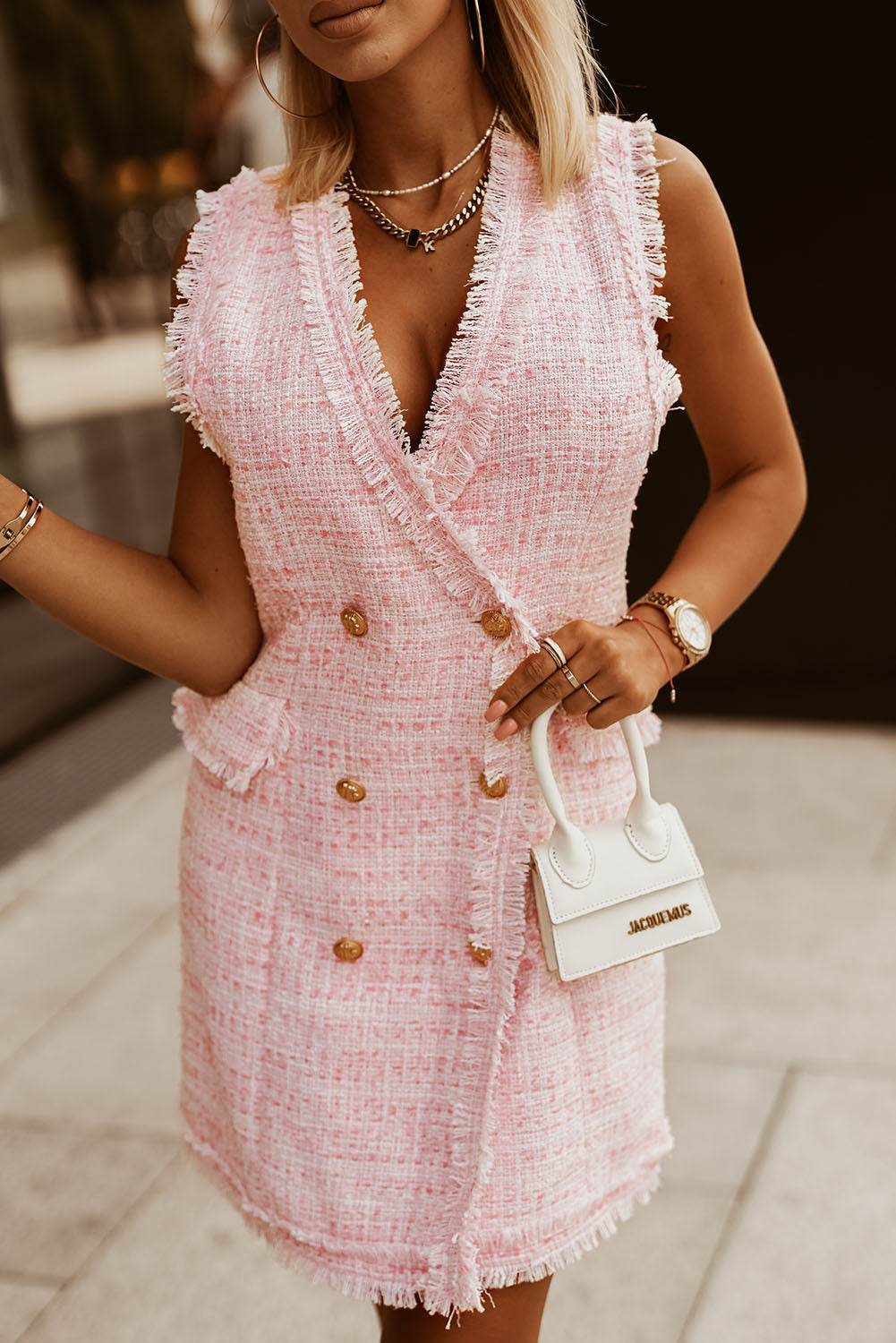 A woman wearing Frayed Edge Double Breasted Tweed Vest Dress.