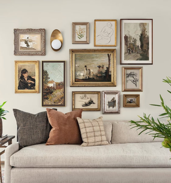 a mix of vintage and modern frames on a gallery wall with link to products