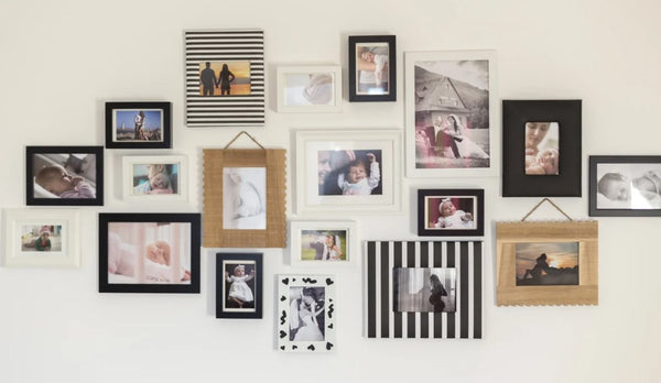 gallery wall with family photos and link to blog post on how to personalize a gallery wall