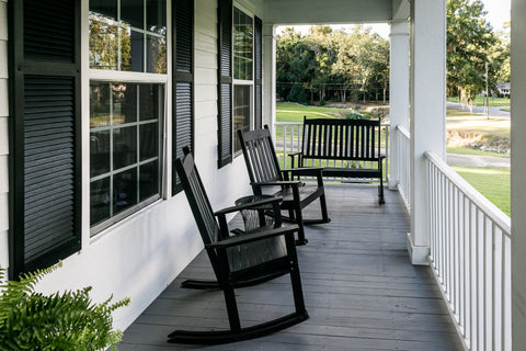 Porch with black chairs