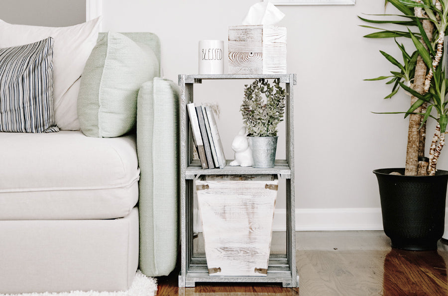 Rustic designed home with stylized gray wooden couch side table with information on lighting in your home