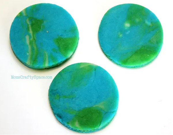 Earth Day Craft homemade green and blue playdough with link to recipe 