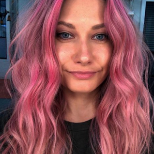 a woman with pink hair