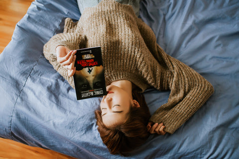 woman reading book