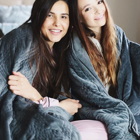 girls under a canadian blanket