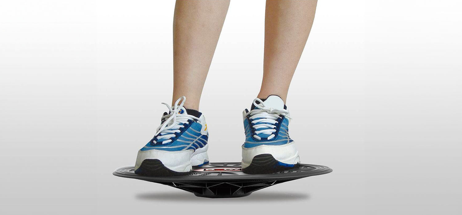 Person standing on a balance board