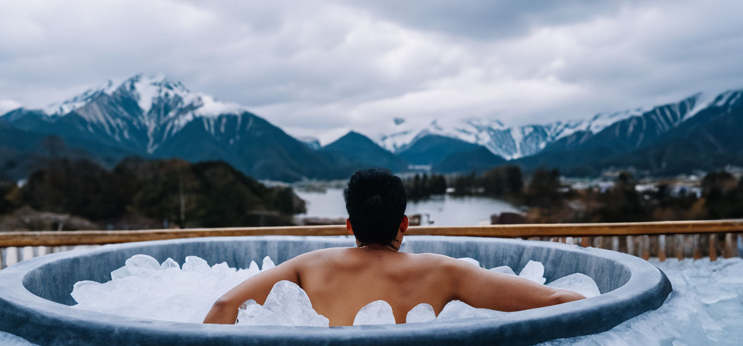 Man sitting in outdoor ice bath