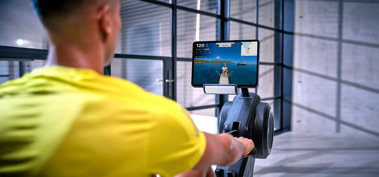 Man exercising on a rowing machine