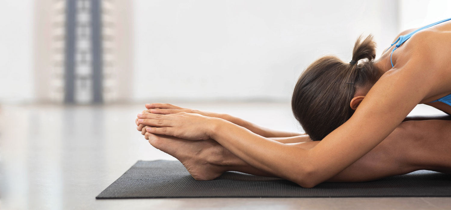 Woman performing stretching exercises