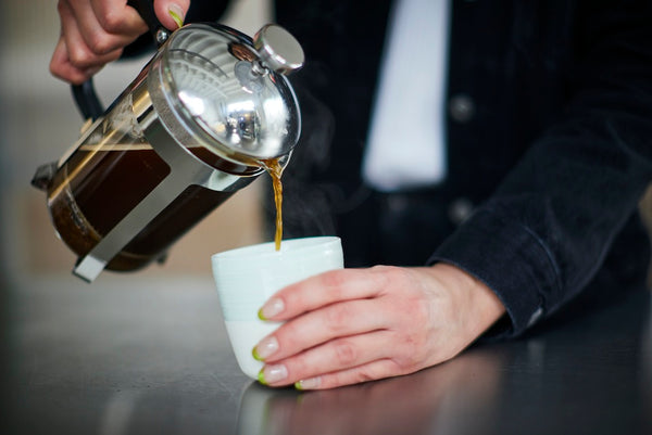 Pouring a cafetiere into a Loveramics mug