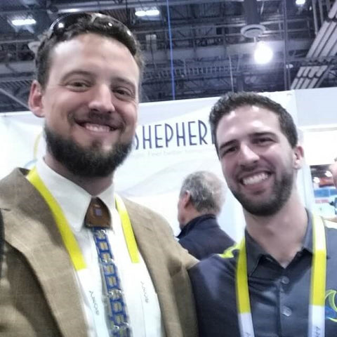 Drew and Joe smiling at the Sleep Shepard booth at CES 2015 in Las Vegas