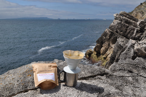 V60 brew with views over the Dorset coastline