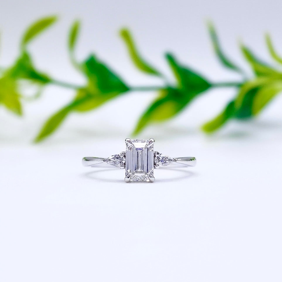 three stone trilogy emerald cut lab diamond engagement ring