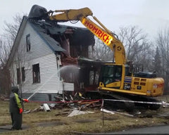Asbestos abatement at a residential demolition job site in Detroit, Michigan