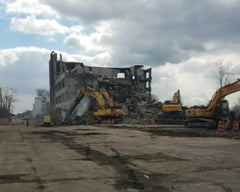 Demolition Crane Operators Demolish Unused Structures in Detroit, Michigan