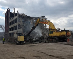Demolition Crane Operators Demolish Unused Structures in Detroit, Michigan