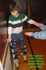 Use a wall, pole, or spotter when first learning to Stilt Walk