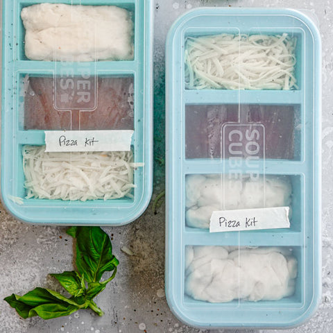 Pizza kits in 1 cup Souper Cubes trays labeled with lid.