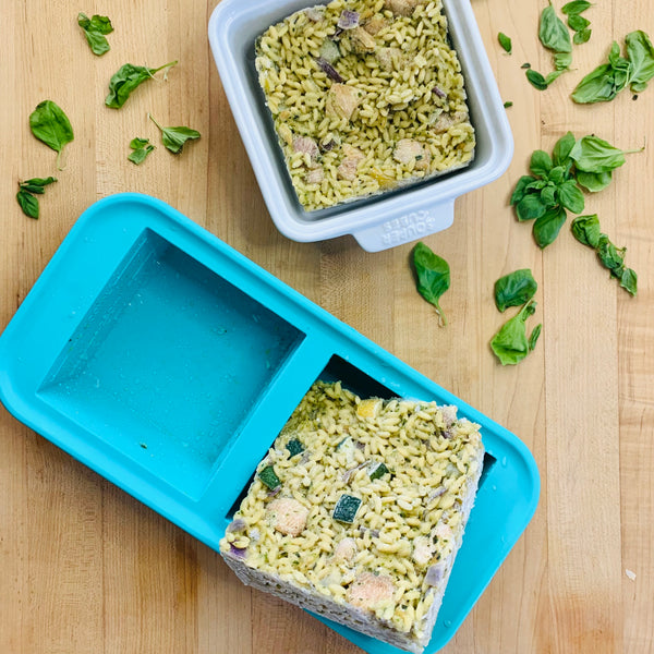 frozen chicken orzo pasta in 2 cup Souper Cubes tray and stoneware