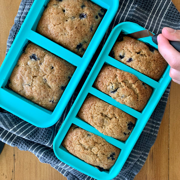 banana bread edge being removed with a small spatula in Souper Cubes