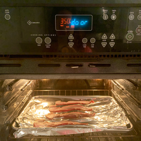 Bacon cooking in oven