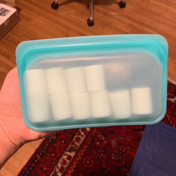 frozen mymilk breast milk cubes in a stasher bag