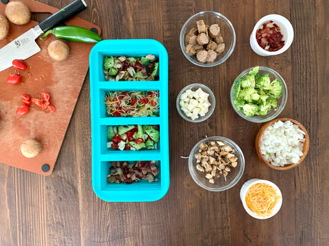 Overview shot of quiche being made in Souper Cubes with various toppings