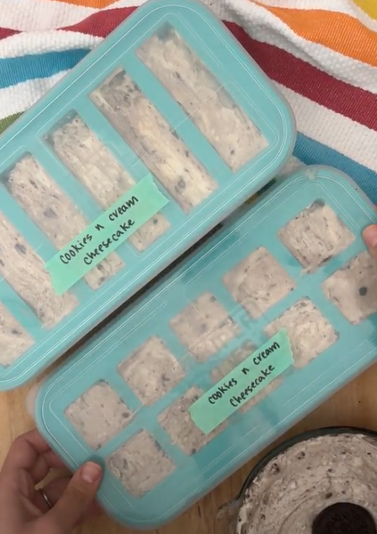 cookies and cream cheesecake ice cream bars in Souper Cubes trays ready for the freezer