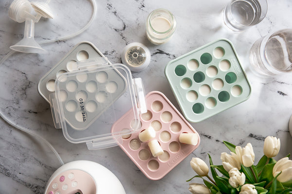 image of three mymilk breast milk trays with lids on