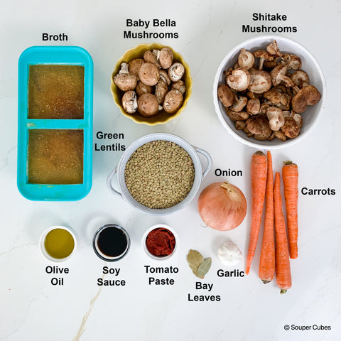 Overhead shot of ingredients for veggie shepherds pie recipe on a white background