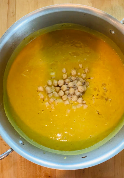 adding chickpeas to soup