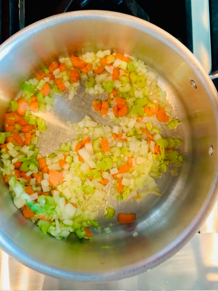 cooking onion, carrot, and celery 