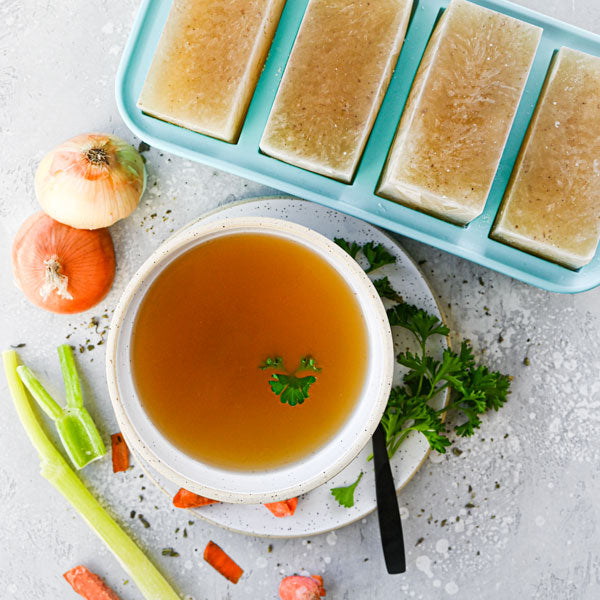 bone broth in bowl and 1 cup Souper Cubes tray