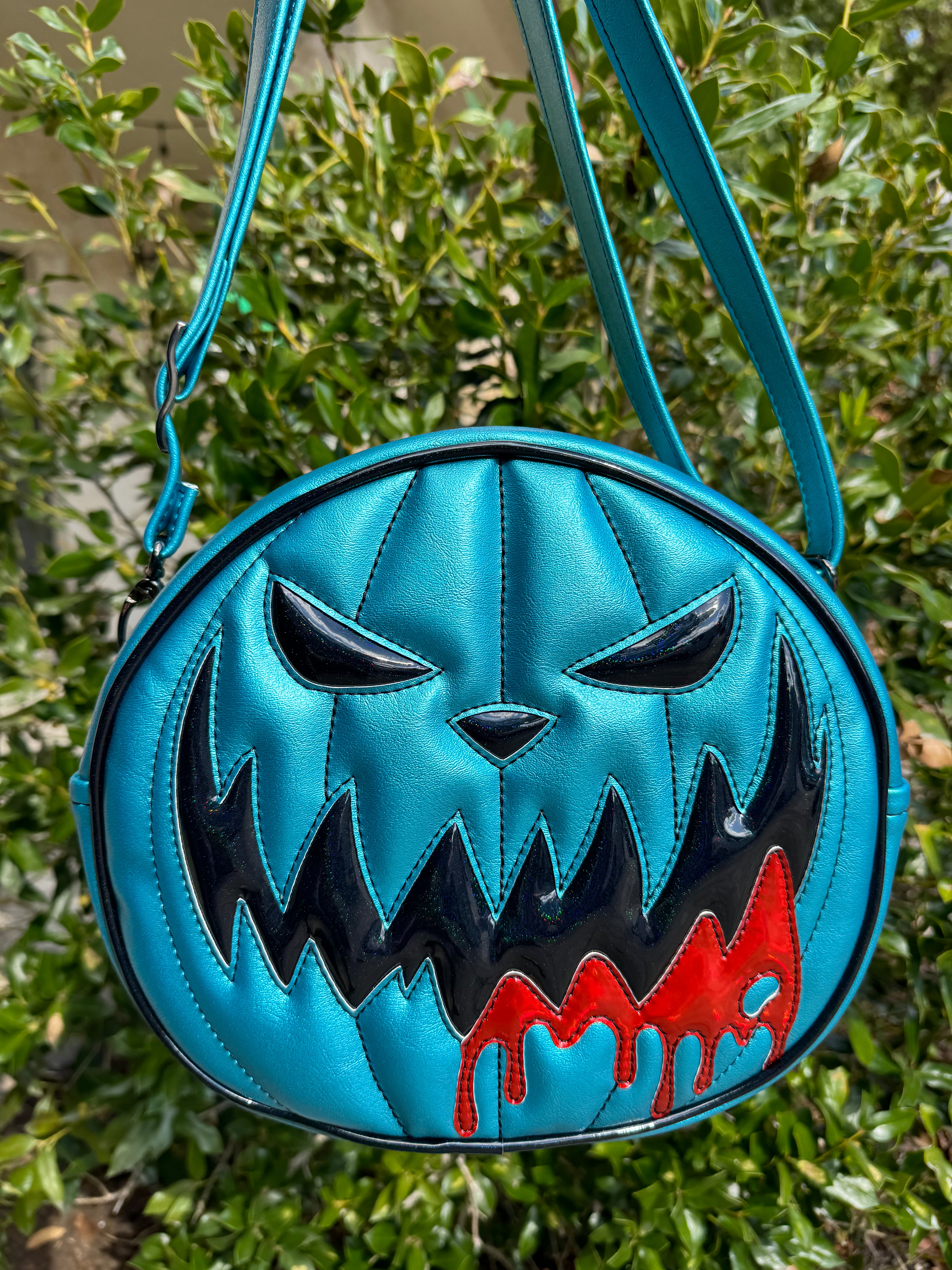 Turquoise Pearl Mean Face Ooze Backpack - Oil Slick Holo Glitter, Red Holo - *PRE-ORDER