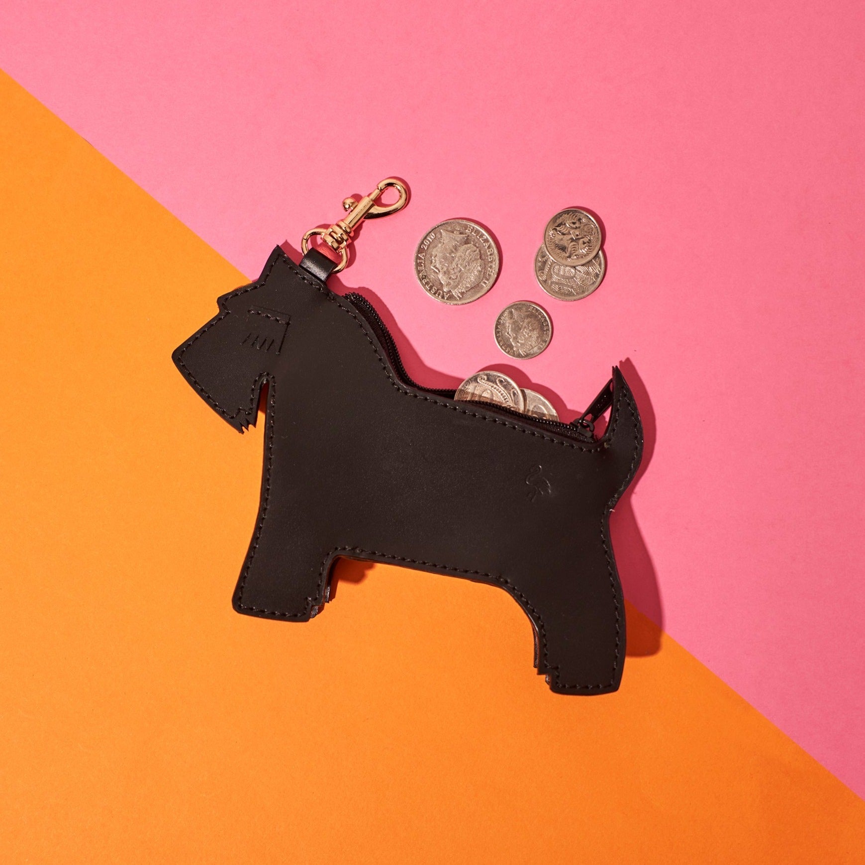 Scottie the Scottish Terrier Wicker Darling coin purse on an orange, pink background