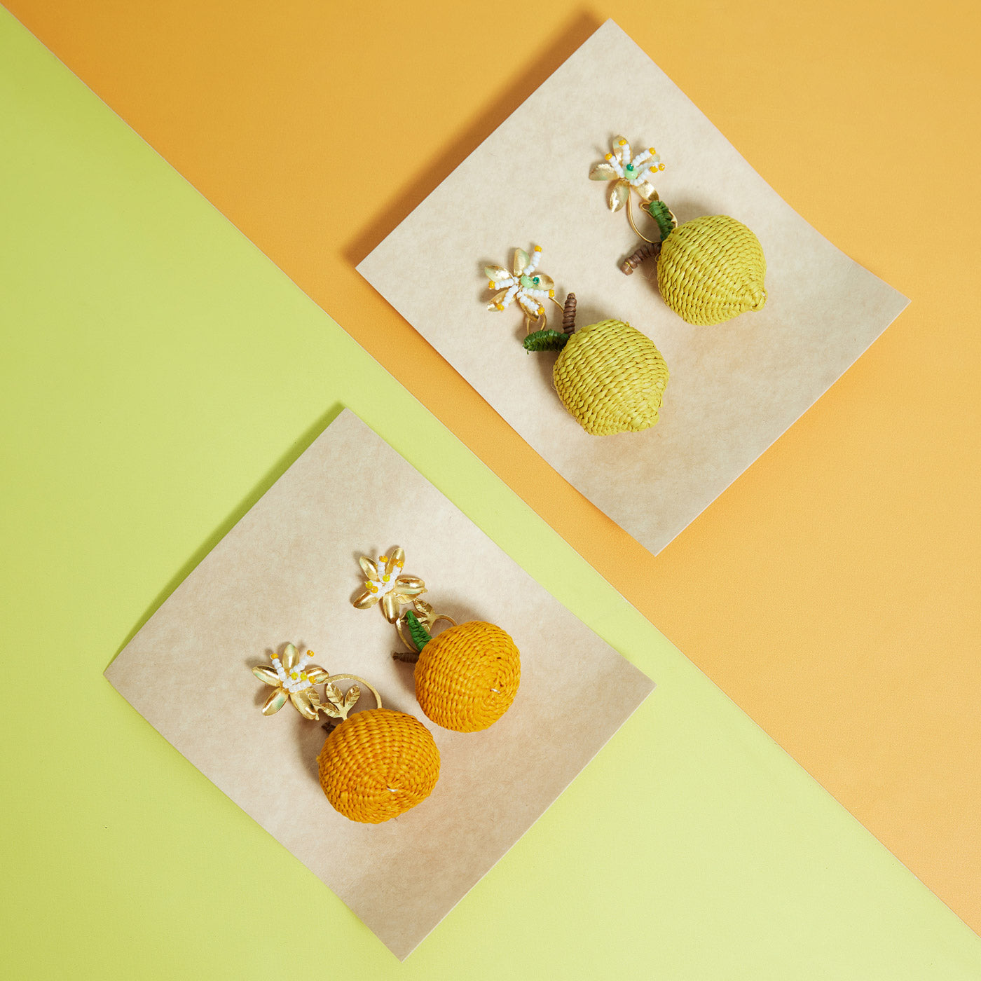 Wicker Darling Hand-Woven Citrus Stud Earrings on a colourful background