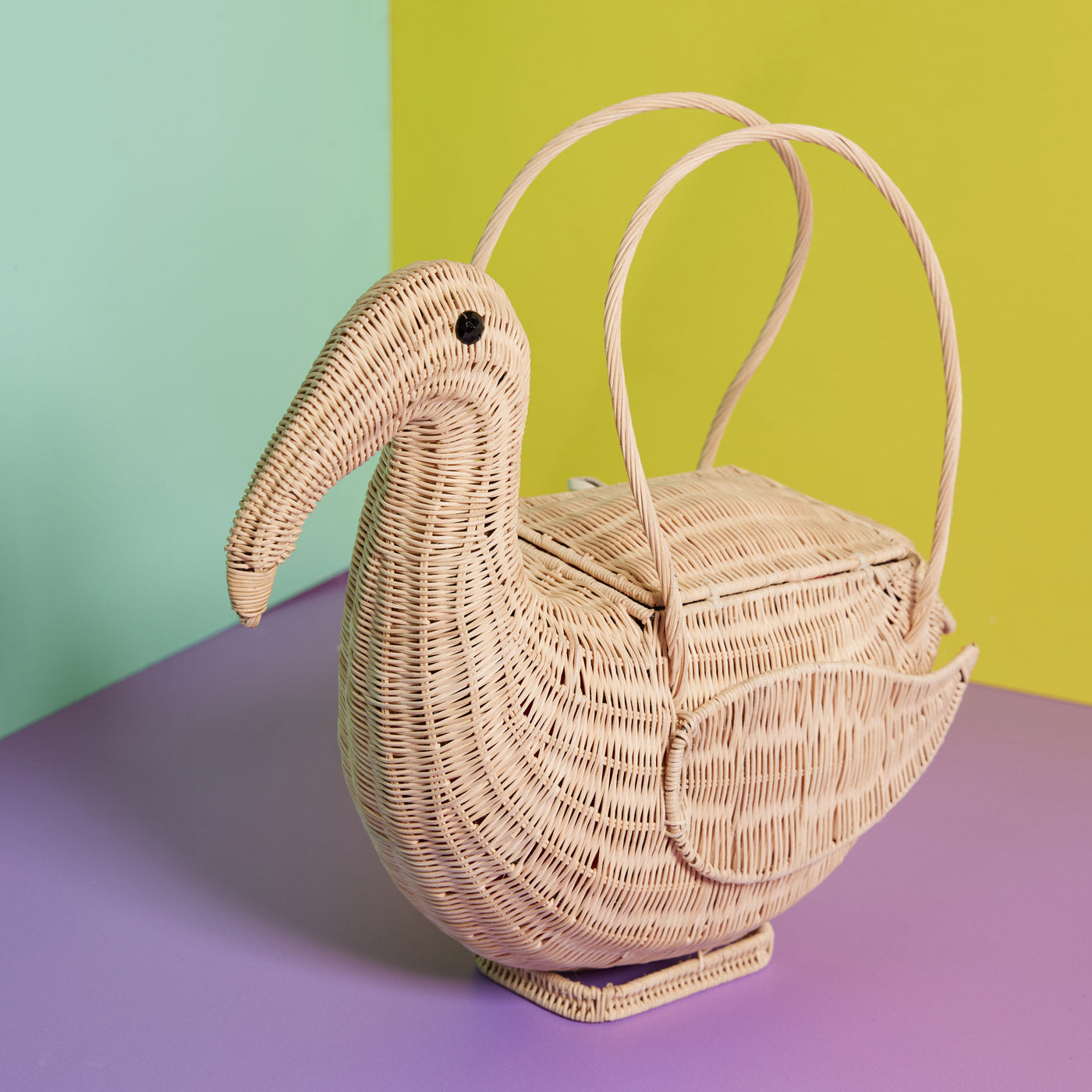 DIY Flamingo Wicker Darling bag on a colourful background