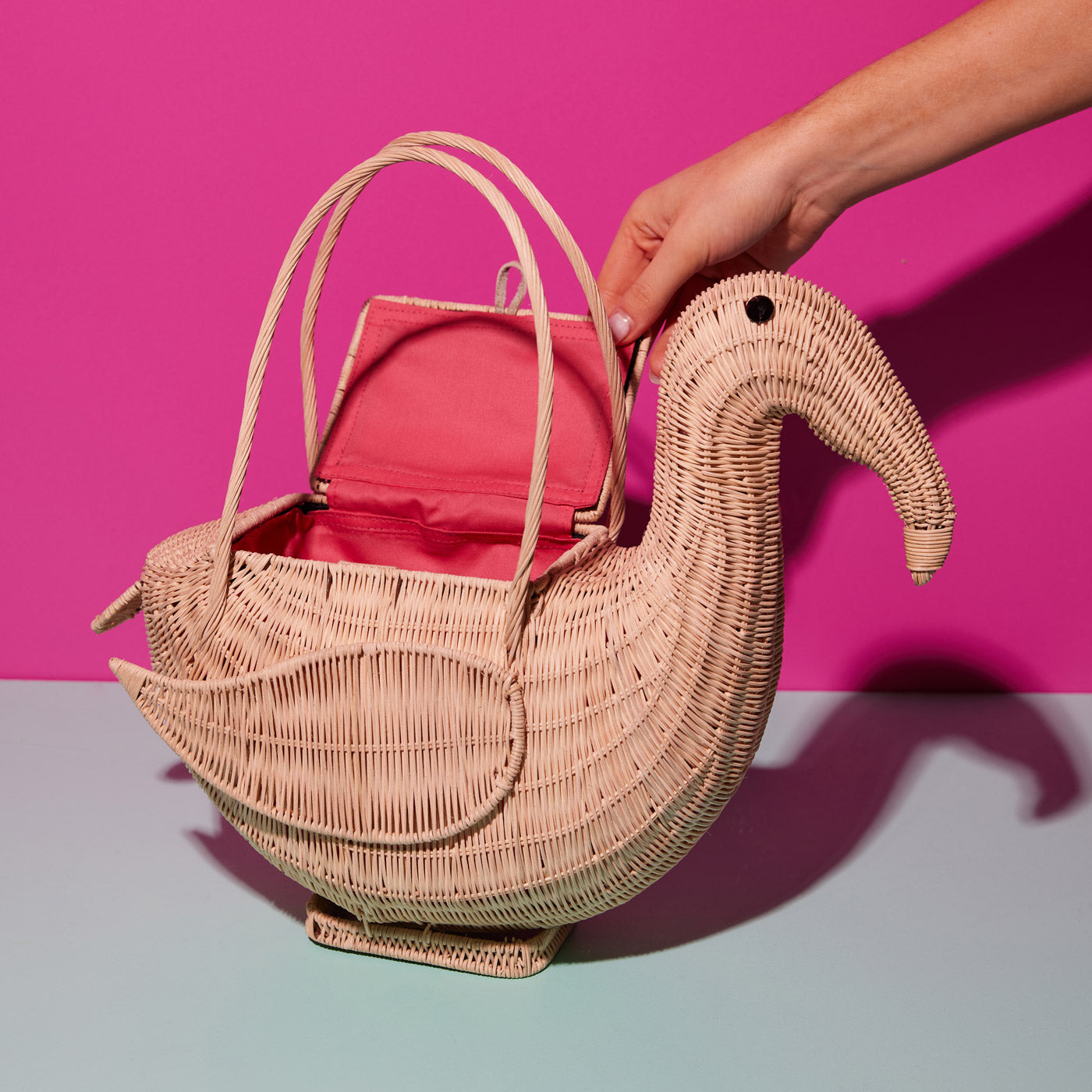 Wicker Darling DIY flamingo bag on a pink background