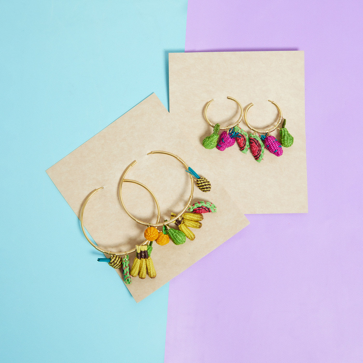 Wicker Darling's Hand-Woven Fruit Salad Earrings on a colourful background