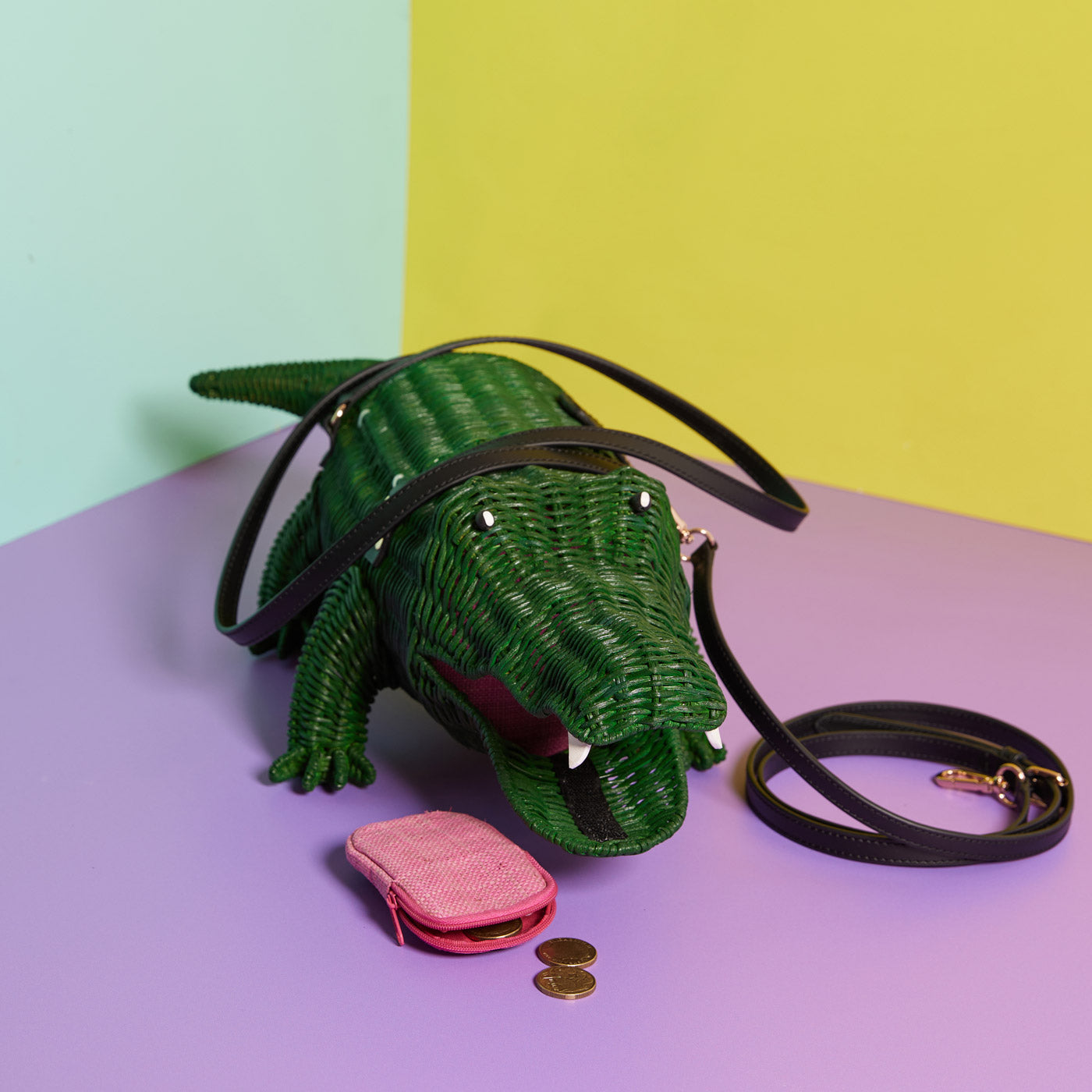 Wicker Darling Crocogator the Crocodile Bag with pink coin purse on a colourful background