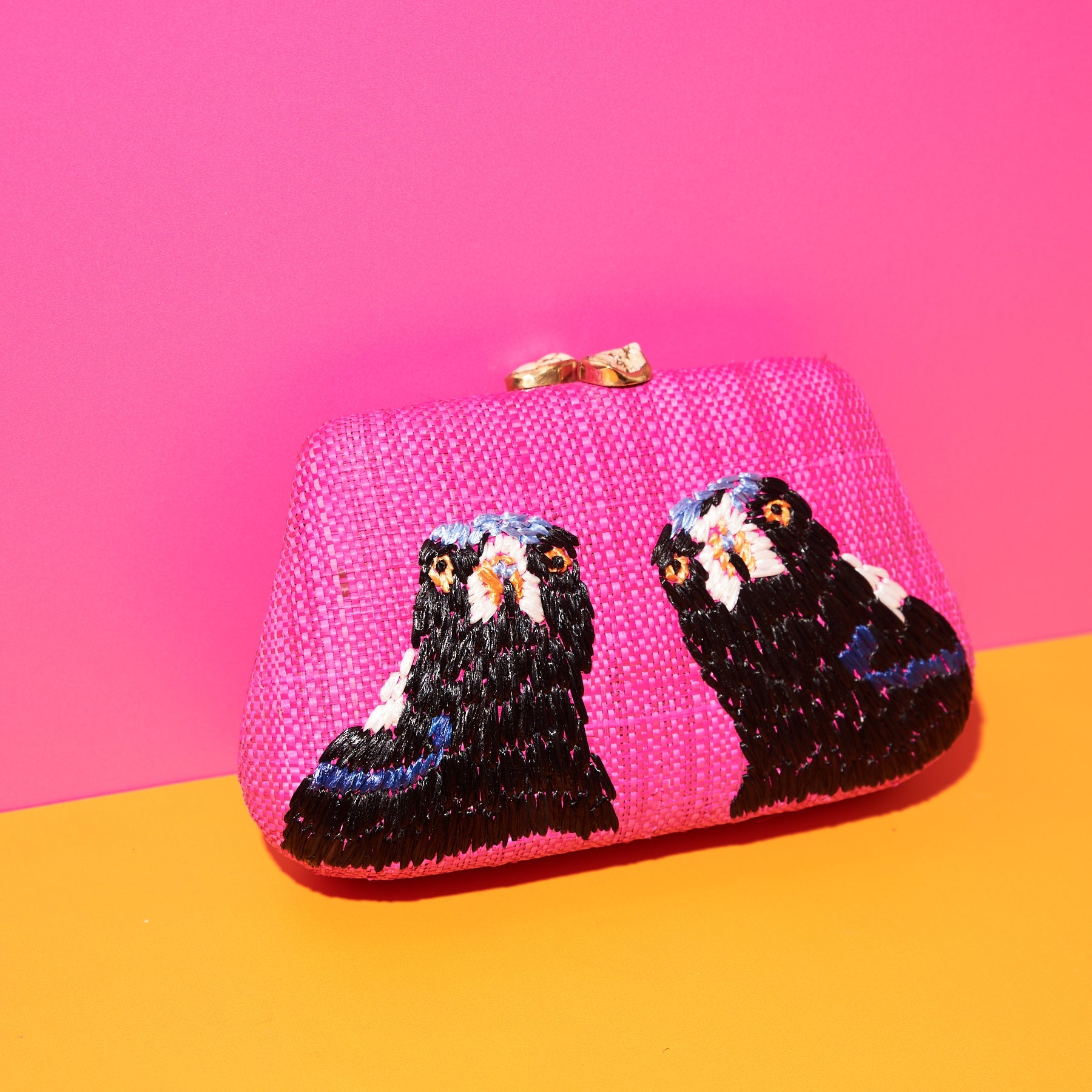 Wicker Darling's pink Magpie clutch