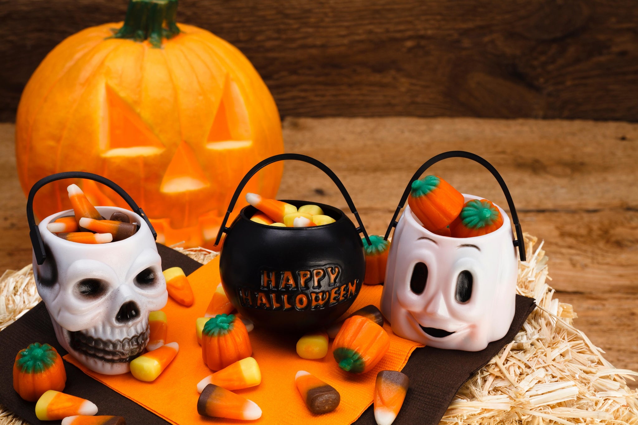 Halloween baskets filled with halloween corn and pumpkin candies