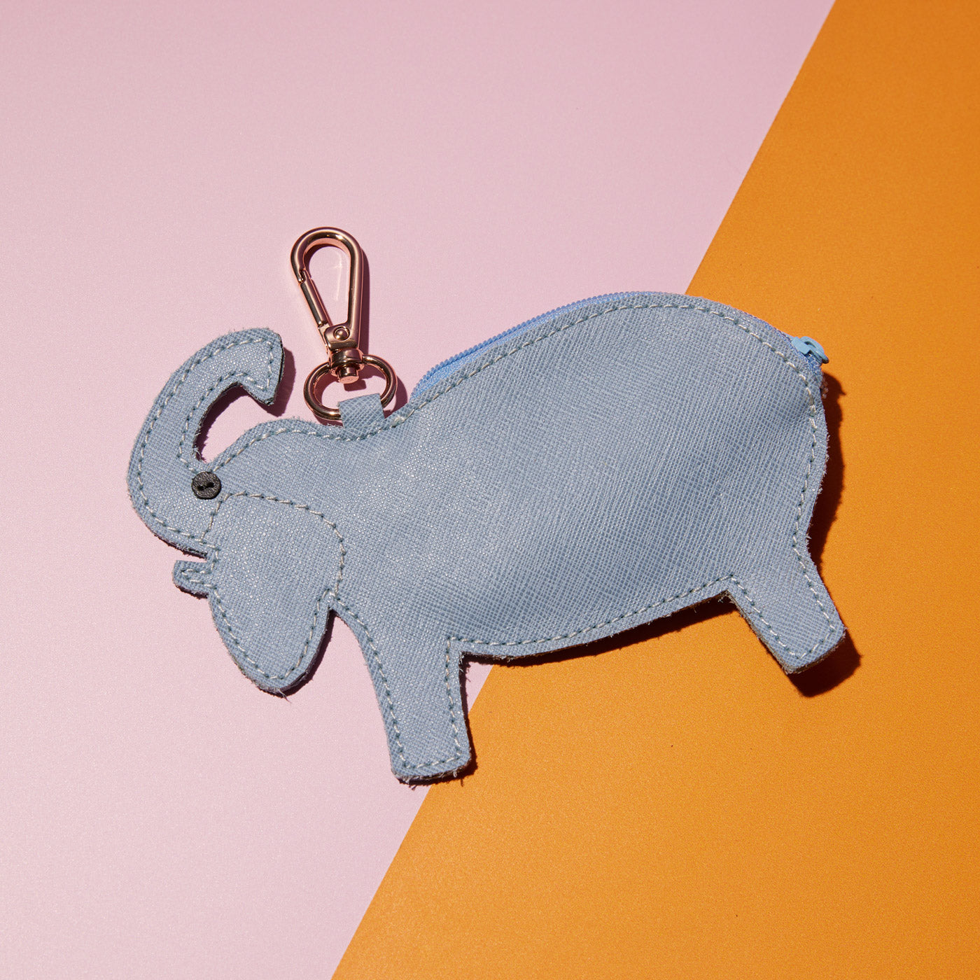 Wicker Darling's Mel-ephant the elephant coin purse on a colourful background