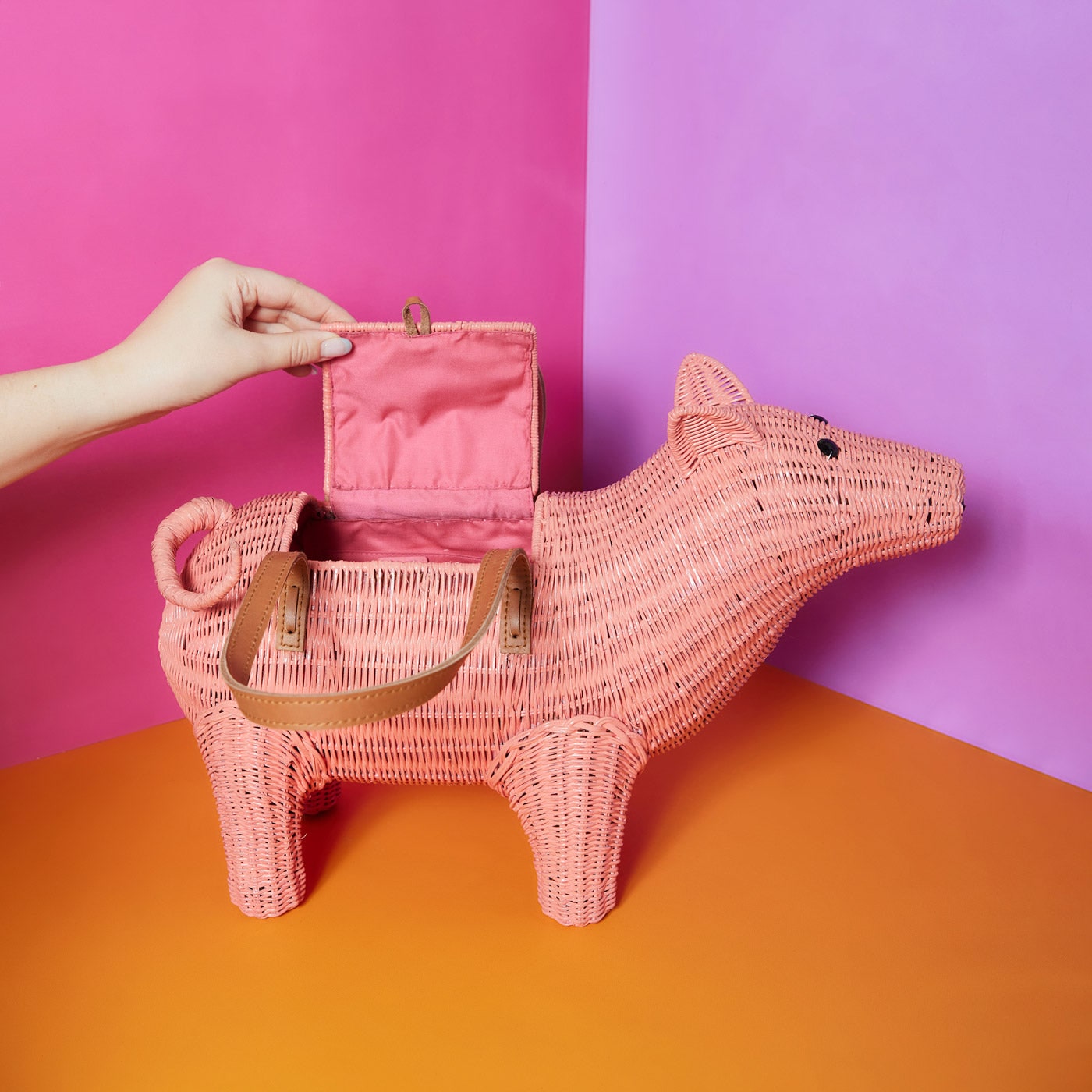 Wicker Darling's Hamlet Hambag the pig purse on a colourful background