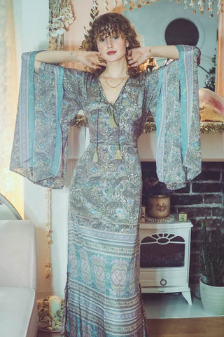 model wears cassidy bohemian maxi dress with kimono sleeves kaftan style dress in mirage powder light blue paisley colour by all about audrey