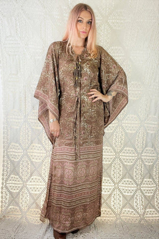 model wears cassidy bohemian maxi dress with kimono sleeves kaftan style dress in rosewater pink paisley colour by all about audrey