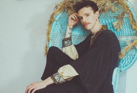 model wears aquaria kimono in vampy black one size fits all gender neutral clothing by all about audrey